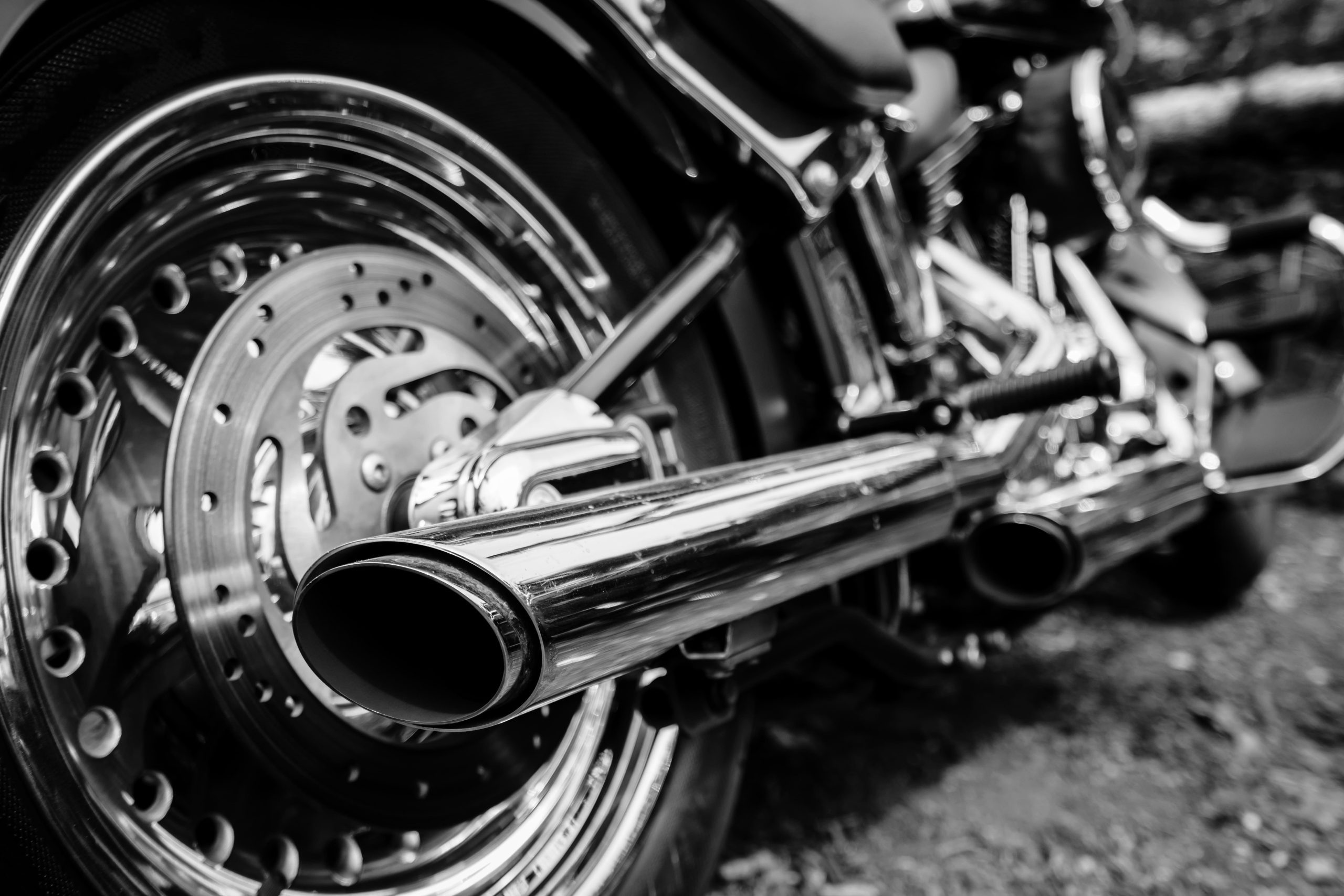 rear-view-of-motorcycle-exhaust-chrome-pipes-2021-10-06-09-51-50-utc